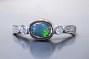 Solid Black Opal and Diamond RIng